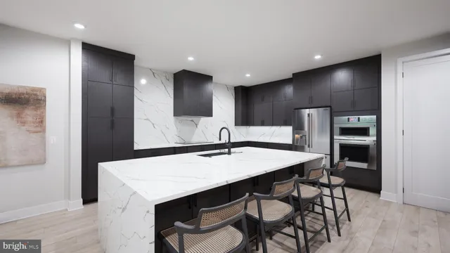 a bathroom with a double vanity sink mirror and bathtub