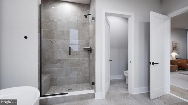 a kitchen with stainless steel appliances refrigerator dining table and chairs