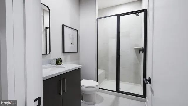 a kitchen with a dining table cabinets appliances and a counter top space