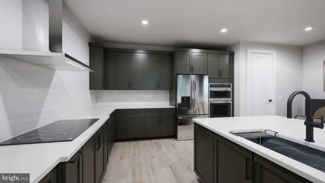 a spacious bathroom with a double vanity sink mirror and bathtub