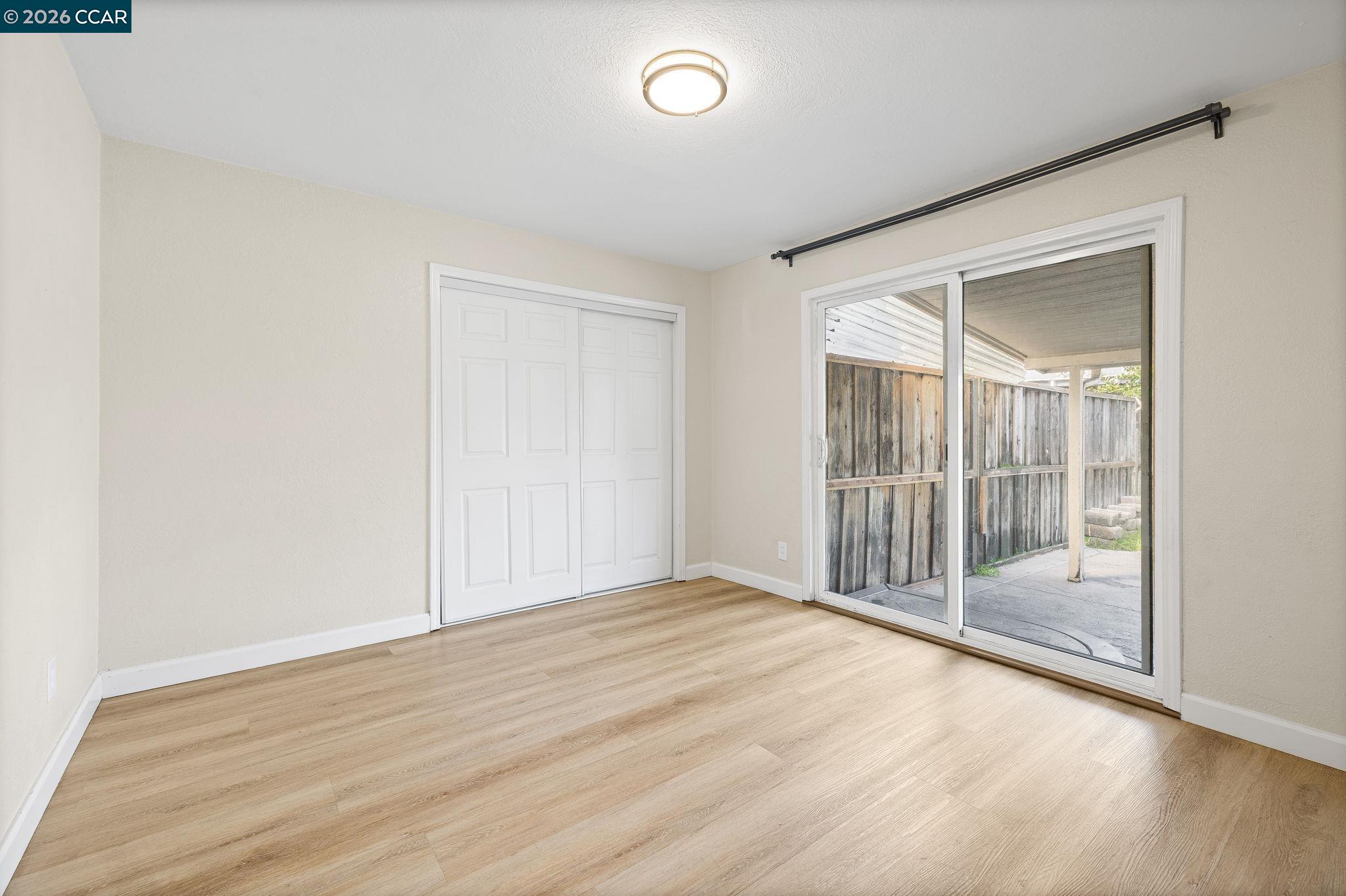 4820 Blum Road Martinez, CA 94553 - Photo 14 of 46 a view of empty room with wooden floor