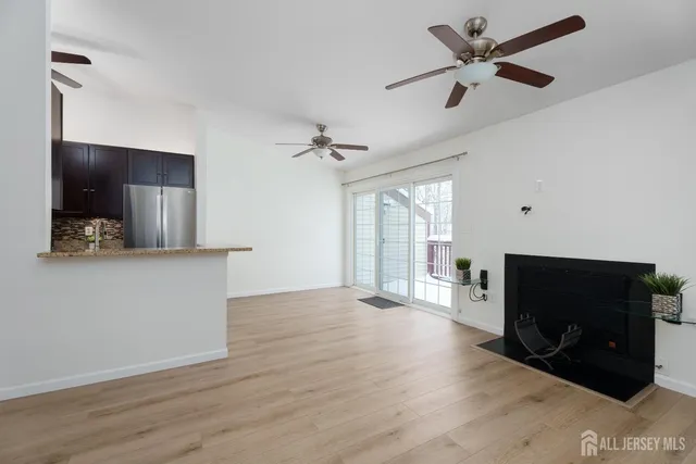 a view of a livingroom with a flat screen tv