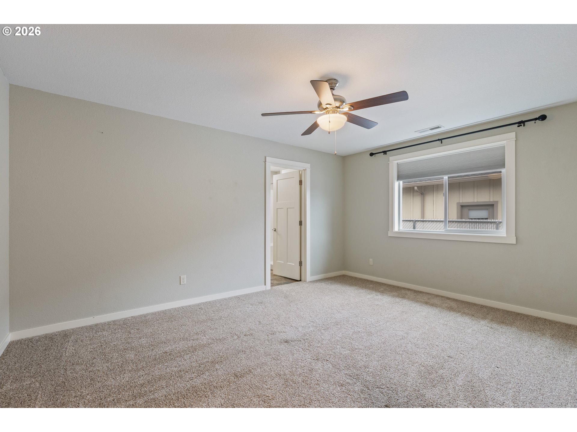 409 South State Street Sutherlin, OR 97479 - Photo 21 of 47 a view of an empty room with a window