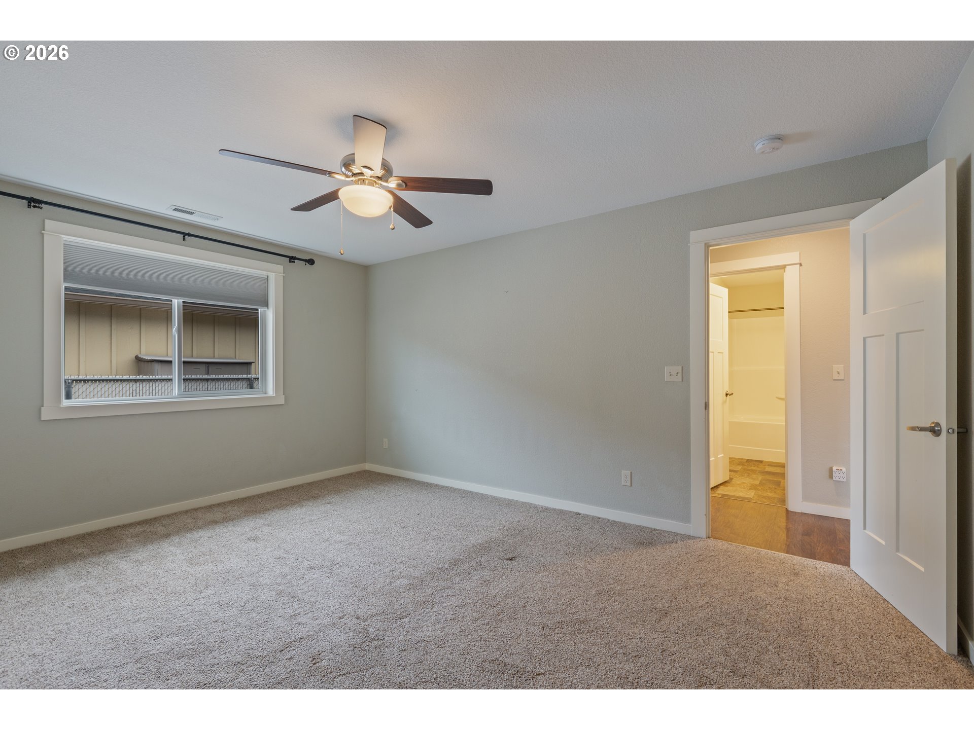 409 South State Street Sutherlin, OR 97479 - Photo 22 of 47 a view of empty room with fan and window
