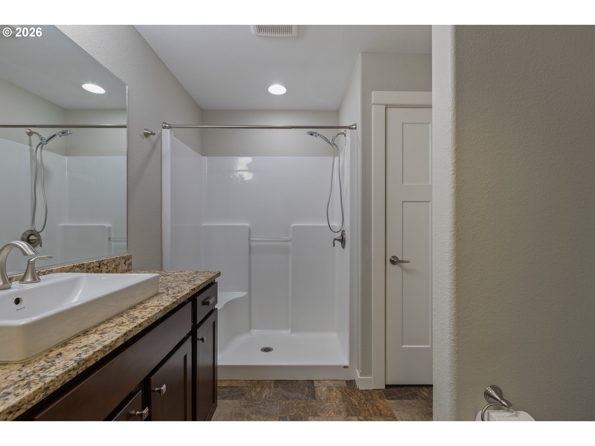 409 South State Street Sutherlin, OR 97479 - Photo 28 of 47 a bathroom with a granite countertop sink mirror and double