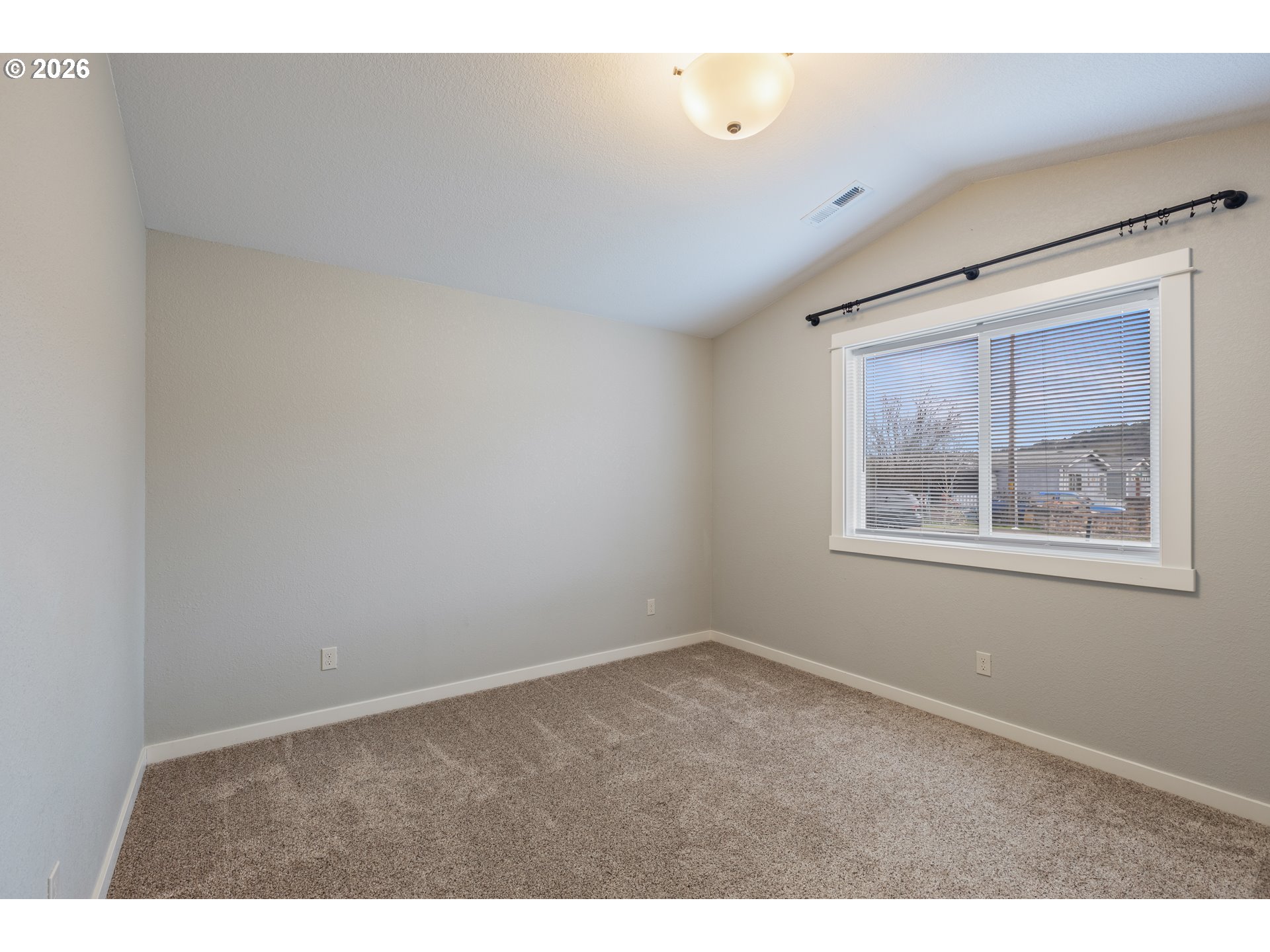 409 South State Street Sutherlin, OR 97479 - Photo 32 of 47 a view of an empty room with a window