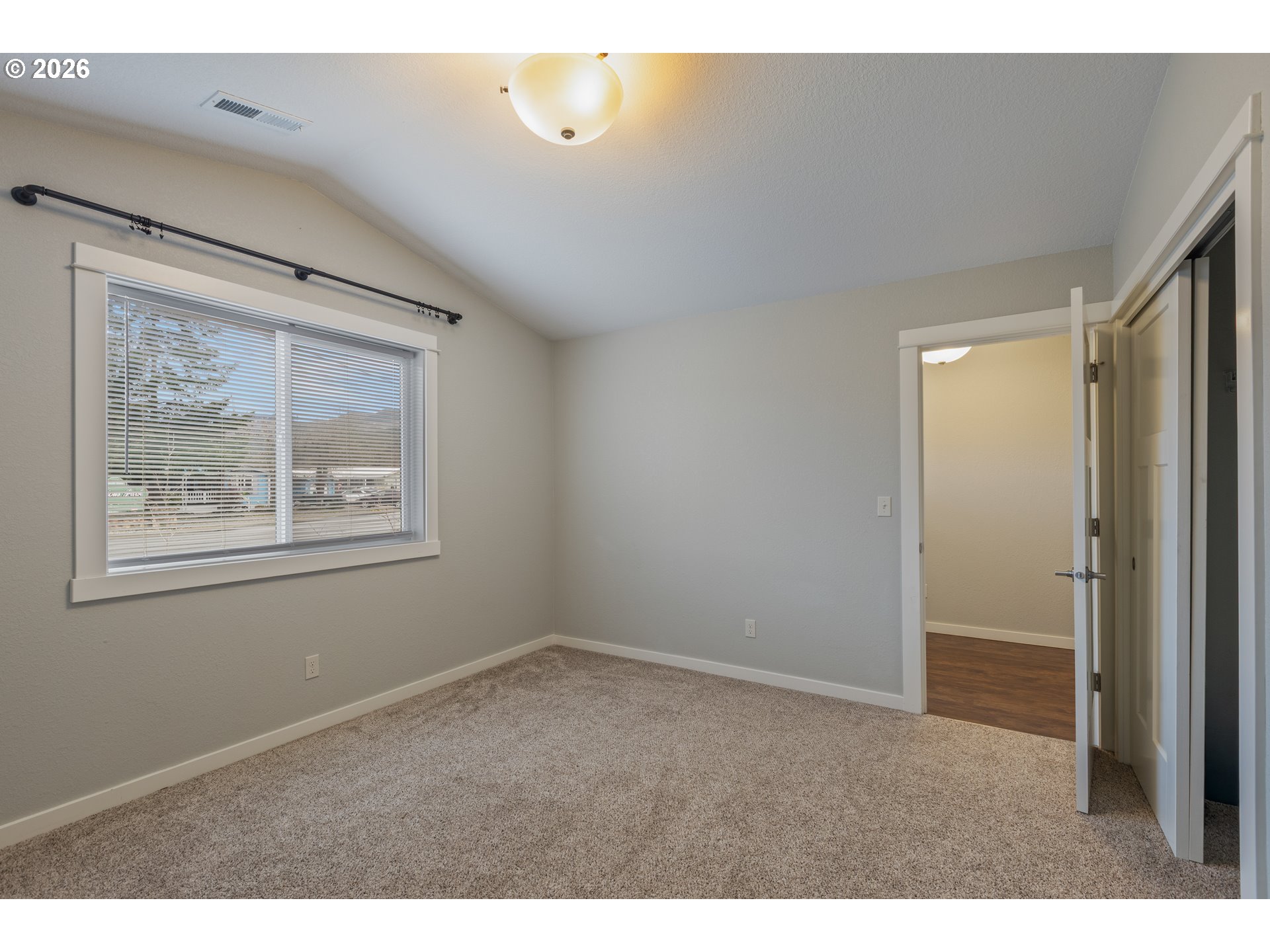 409 South State Street Sutherlin, OR 97479 - Photo 33 of 47 a view of an empty room with closet and a window