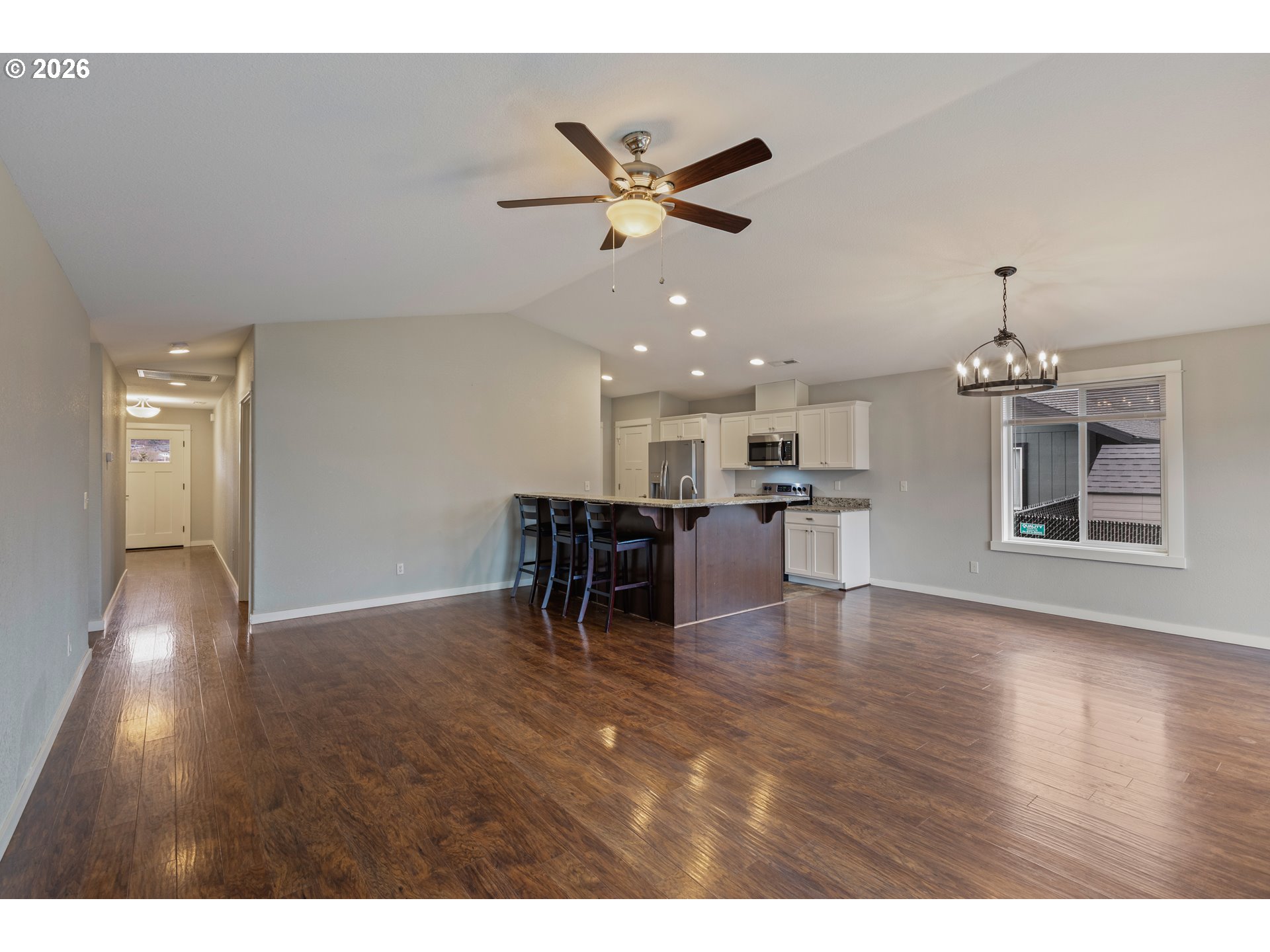409 South State Street Sutherlin, OR 97479 - Photo 6 of 47 a view of a livingroom with a kitchen and furniture