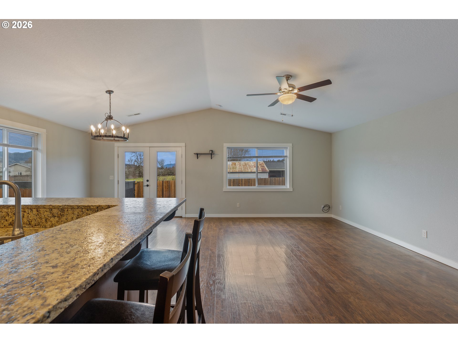 409 South State Street Sutherlin, OR 97479 - Photo 10 of 47 a view of a livingroom with furniture and chandelier fan