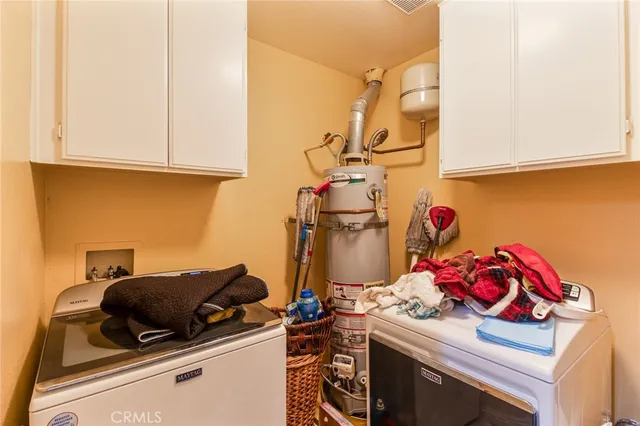 a kitchen with a stove and cabinets