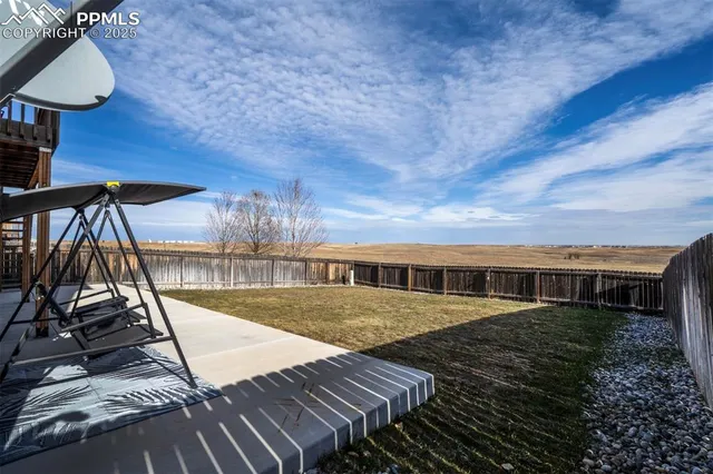 a view of balcony with wooden floor
