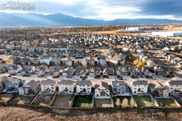 a utility room with multiple dryer and washer