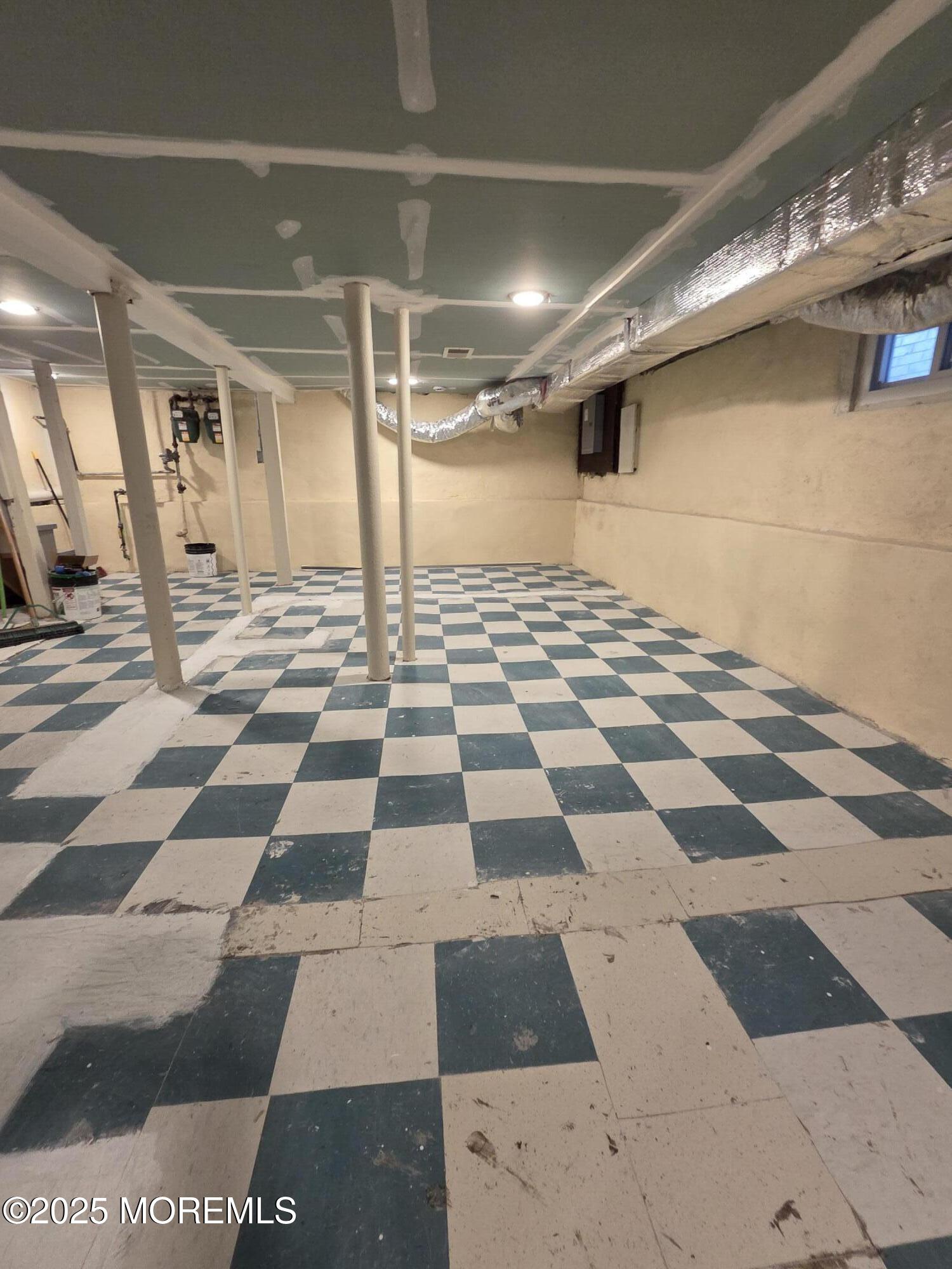 216 Delaware Street Elizabeth Port, NJ 07206 - Photo 39 of 40 a view of a black and white checkered floor