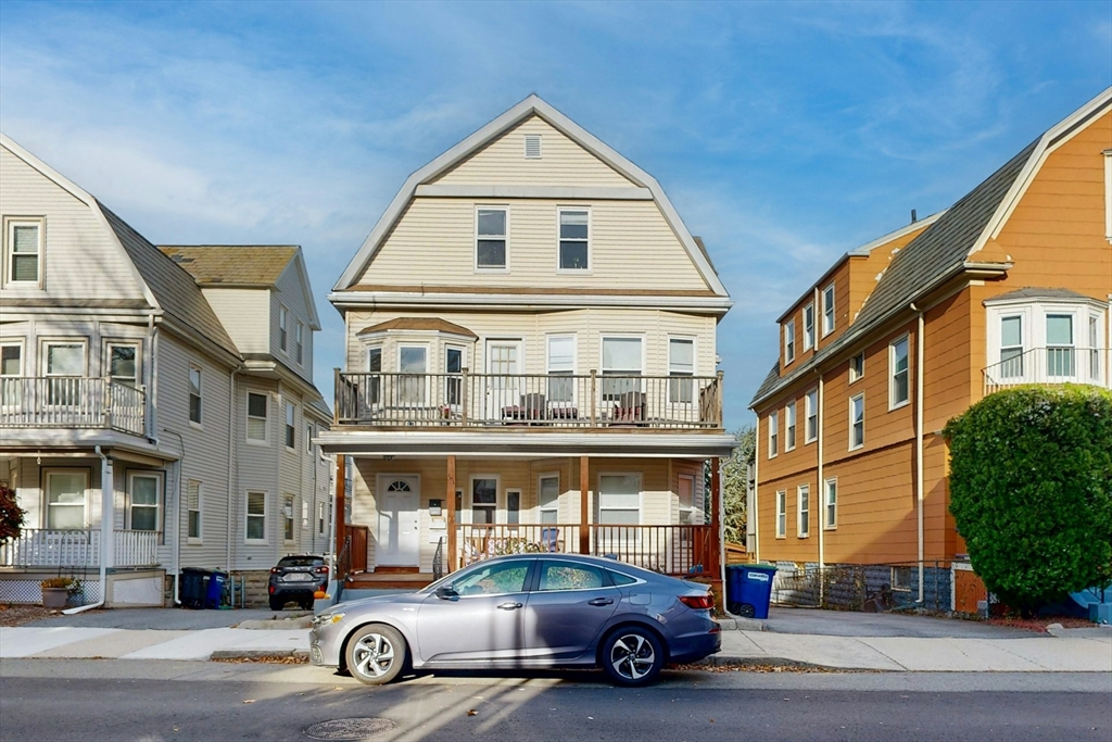 a car parked in front of a building