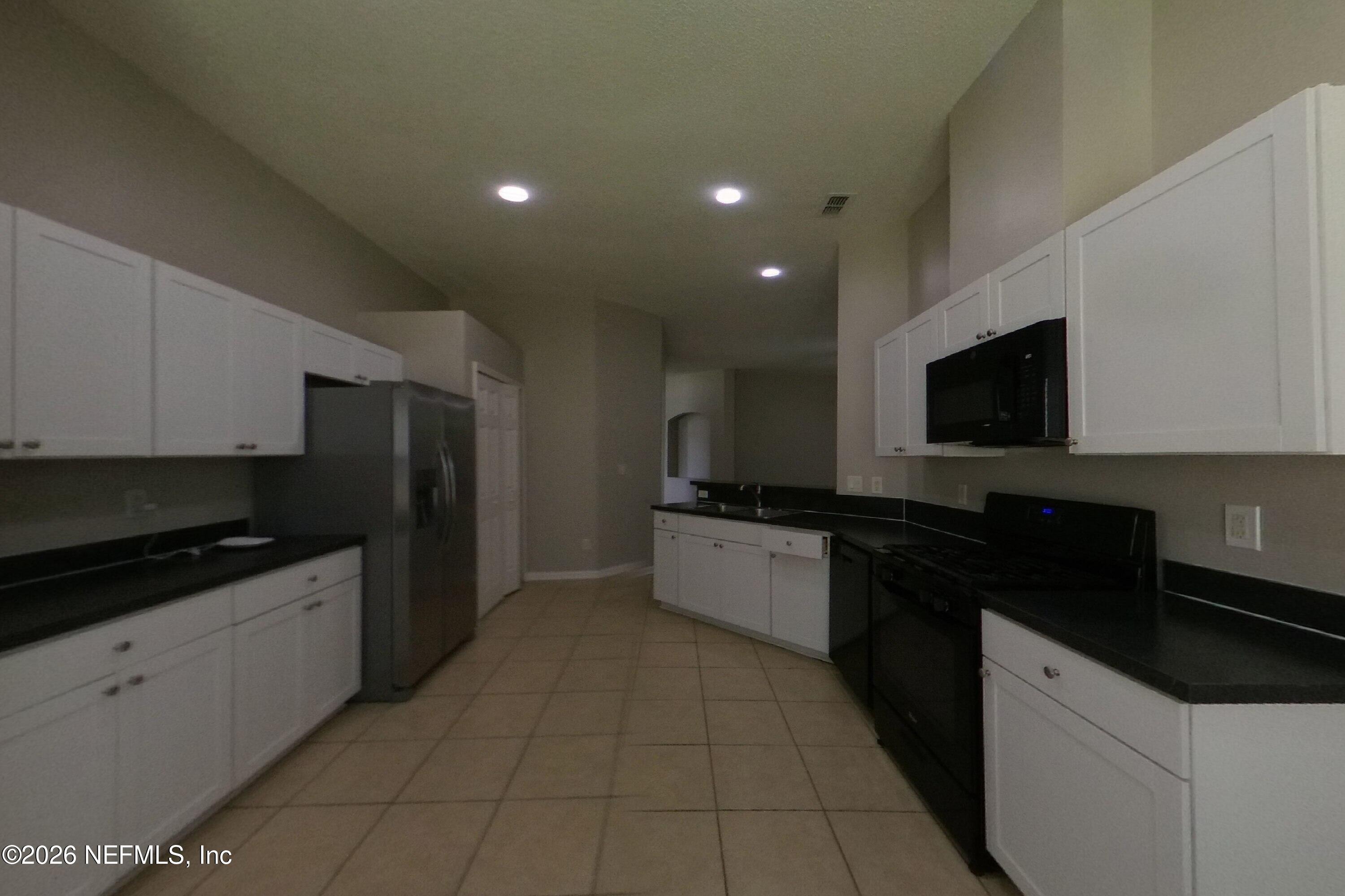 10310 Red Tip Road Jacksonville, FL 32218 - Photo 4 of 17 3_Image_rHniwFpXcw