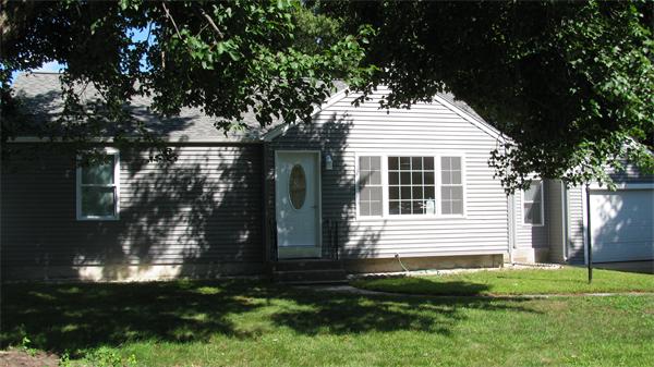 53 Kane Street Springfield, MA 01119 - Photo 1 of 10 a front view of a house with a yard
