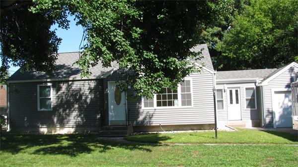 53 Kane Street Springfield, MA 01119 - Photo 2 of 10 a front view of a house with a yard