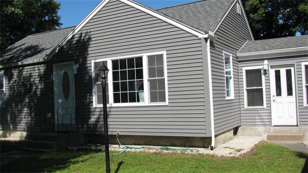 53 Kane Street Springfield, MA 01119 - Photo 3 of 10 a view of a house with a yard