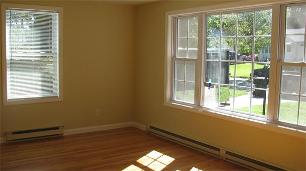 53 Kane Street Springfield, MA 01119 - Photo 8 of 10 a view of a room with wooden floor and windows