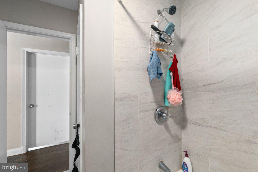 6611 Windsor Mill Road Baltimore, MD 21207 - Photo 11 of 11 a bathroom with a shower