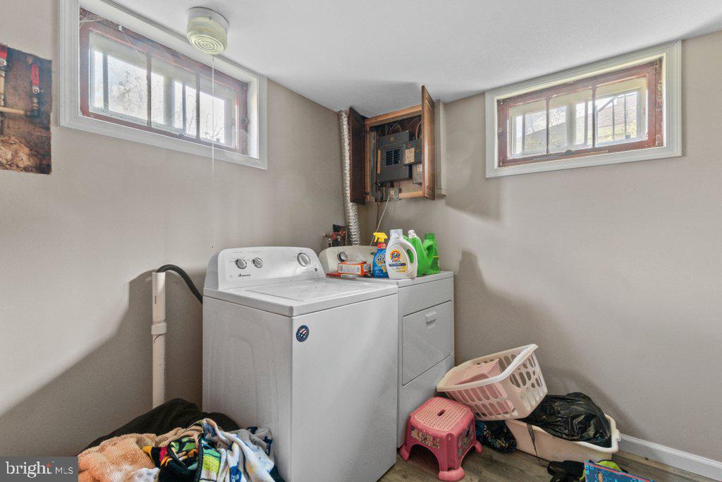 6611 Windsor Mill Road Baltimore, MD 21207 - Photo 6 of 11 a utility room with dryer and washer