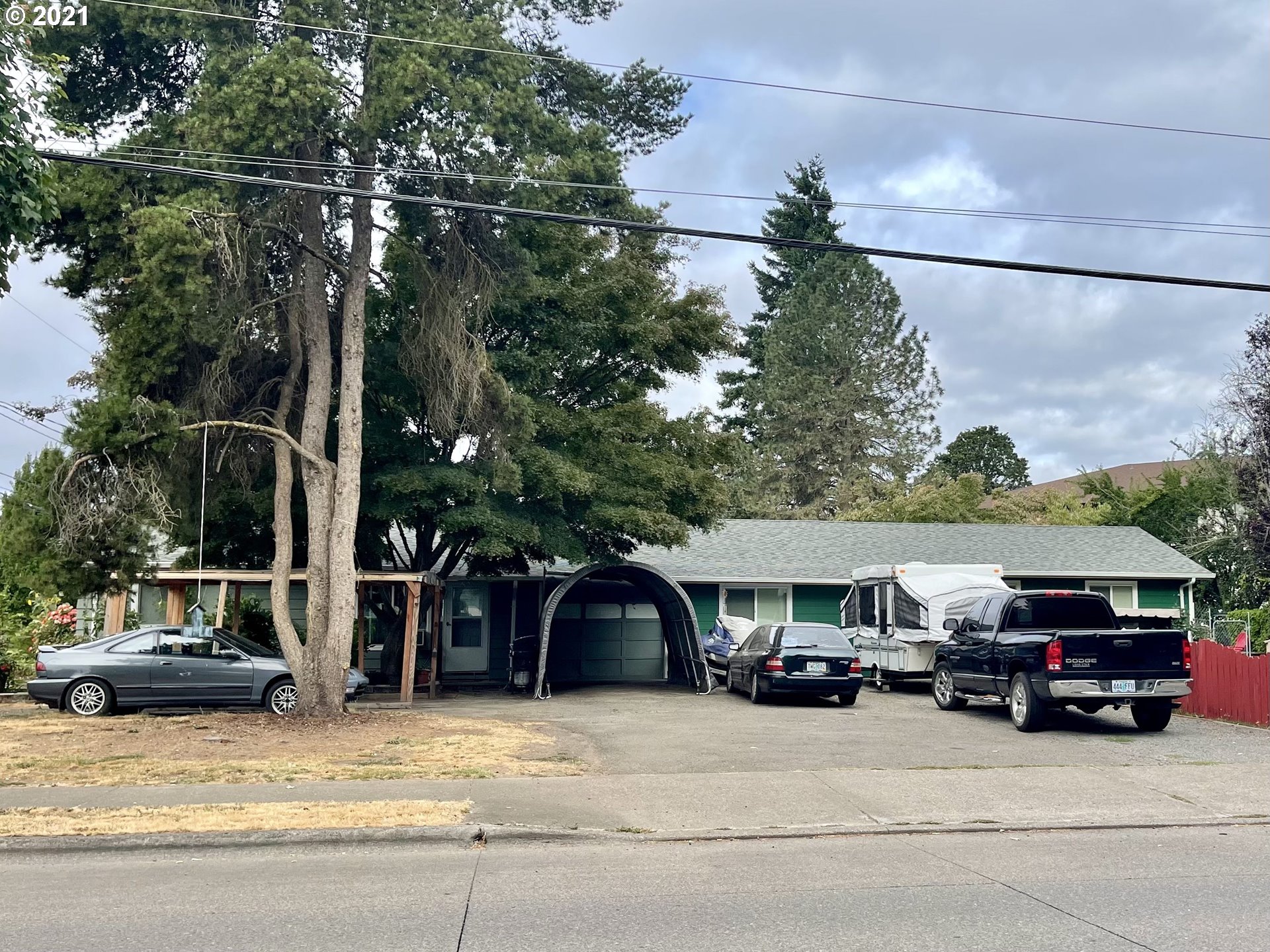 1804 Maple Street Forest Grove, OR 97116 - Photo 1 of 6 a car parked in front of a house
