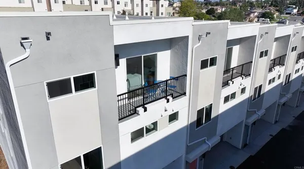 a view of balcony with furniture