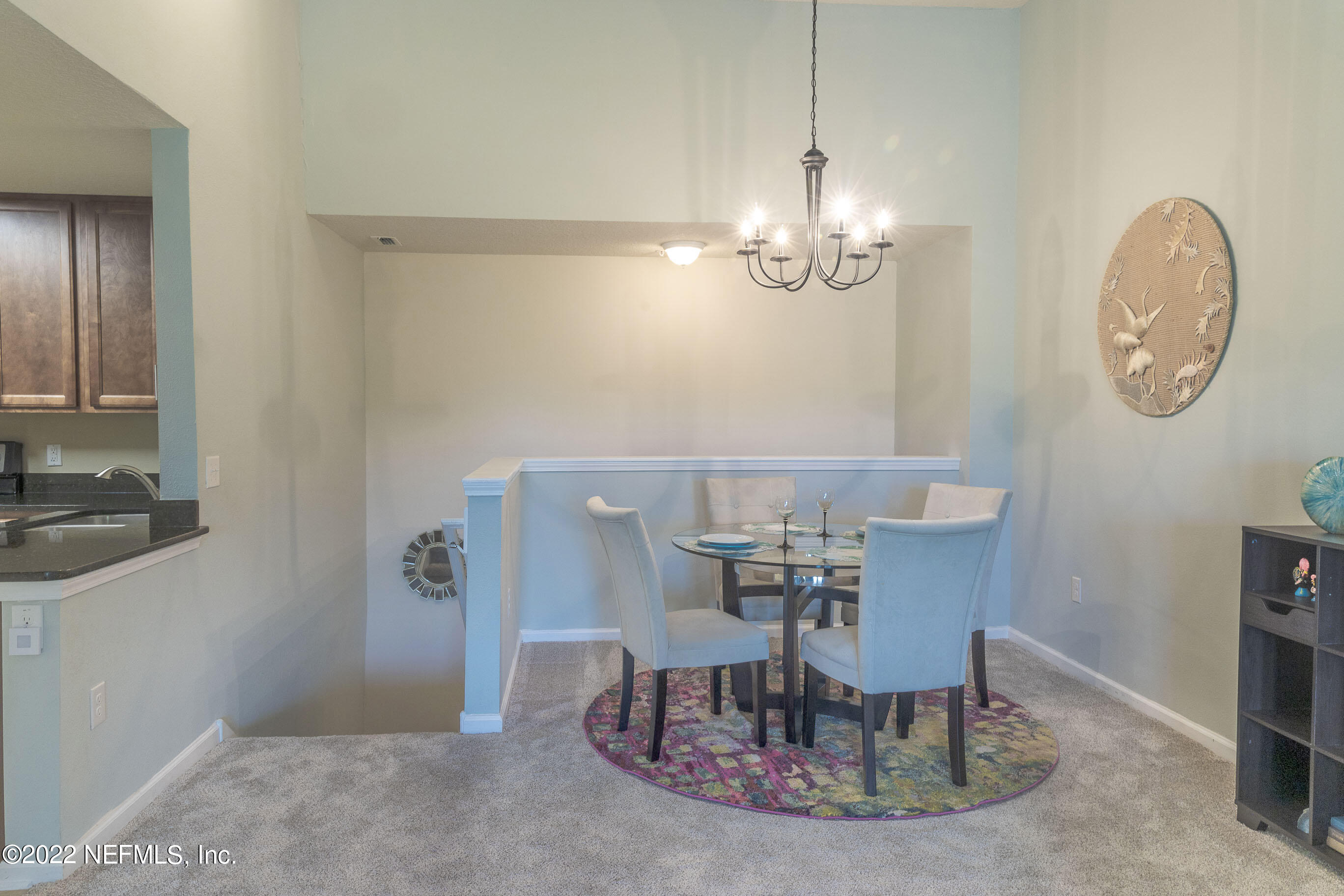 803 Golden Lake Loop St. Augustine, FL 32084 - Photo 5 of 33 a view of a dining room with furniture