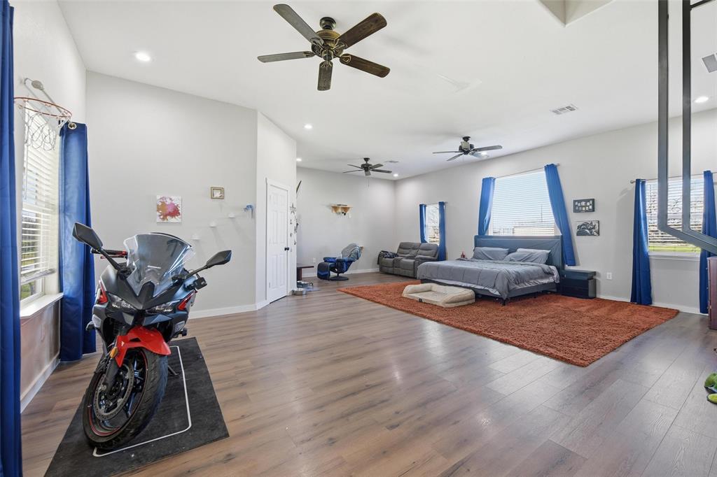 379 Private Road, Unit 4650 Boyd, TX 76023 - Photo 12 of 40 Bedroom featuring dark wood finished floors, recessed lighting, and ceiling fan