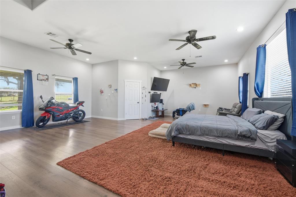 379 Private Road, Unit 4650 Boyd, TX 76023 - Photo 14 of 40 Bedroom featuring multiple windows, light wood-style floors, recessed lighting, and ceiling fan