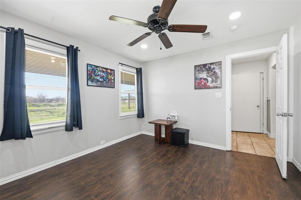 379 Private Road, Unit 4650 Boyd, TX 76023 - Photo 20 of 40 Empty room with wood finished floors, a ceiling fan, and recessed lighting