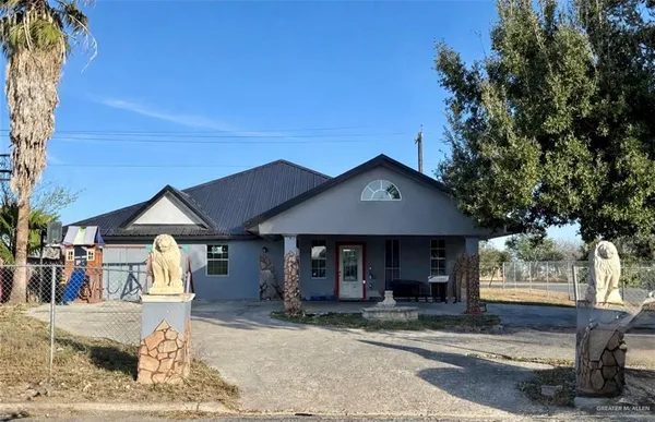 a front view of a house with a porch