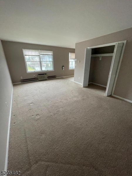 37 East Main Street, Unit 8 Rockaway, NJ 07866 - Photo 7 of 9 a view of empty room with window