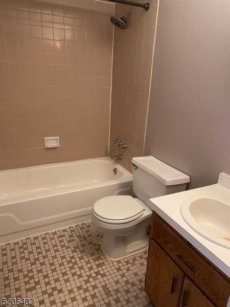 37 East Main Street, Unit 8 Rockaway, NJ 07866 - Photo 8 of 9 a bathroom with a toilet and a shower