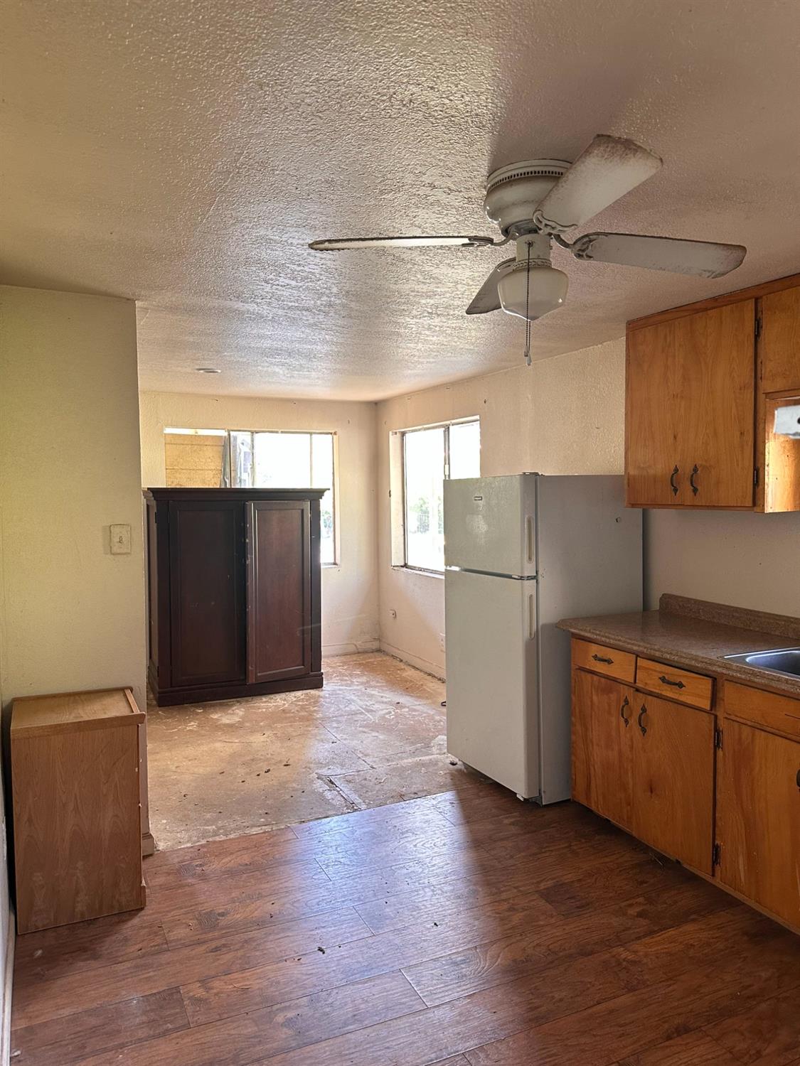 5580 Marysville Road Browns Valley, CA 95918 - Photo 32 of 37 a kitchen with stainless steel appliances granite countertop a refrigerator a sink and a stove