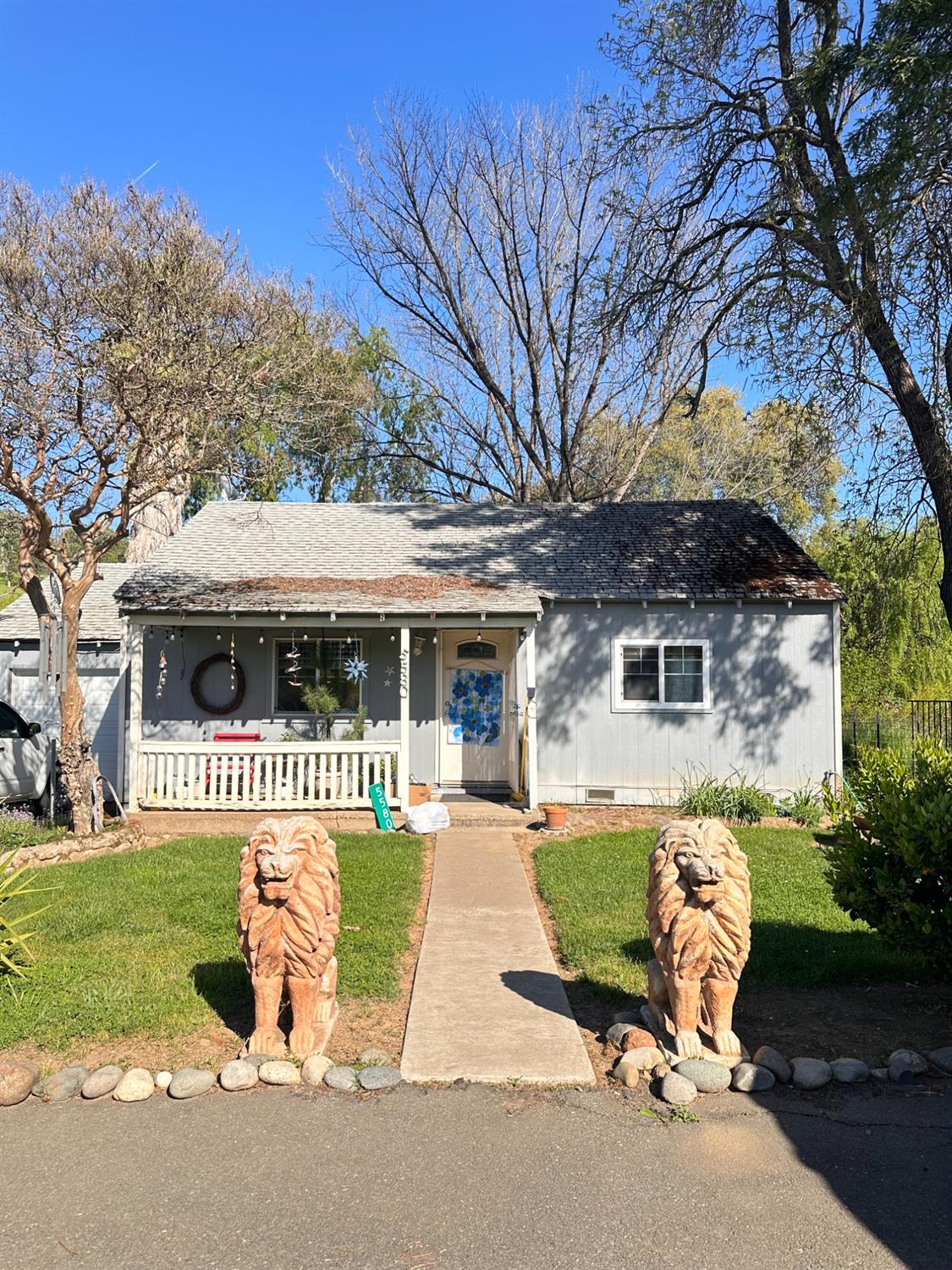 5580 Marysville Road Browns Valley, CA 95918 - Photo 4 of 37 a front view of a house with a yard table and chairs
