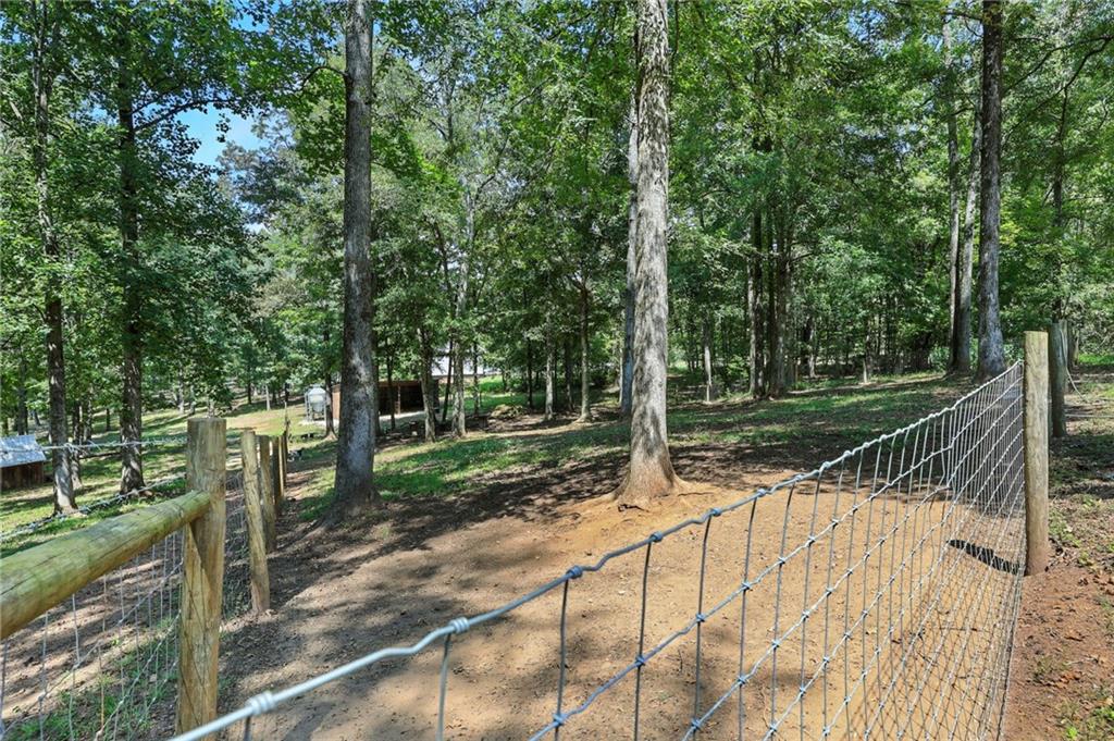 731 Borders Road Commerce, GA 30530 - Photo 14 of 75 a view of a park with large trees