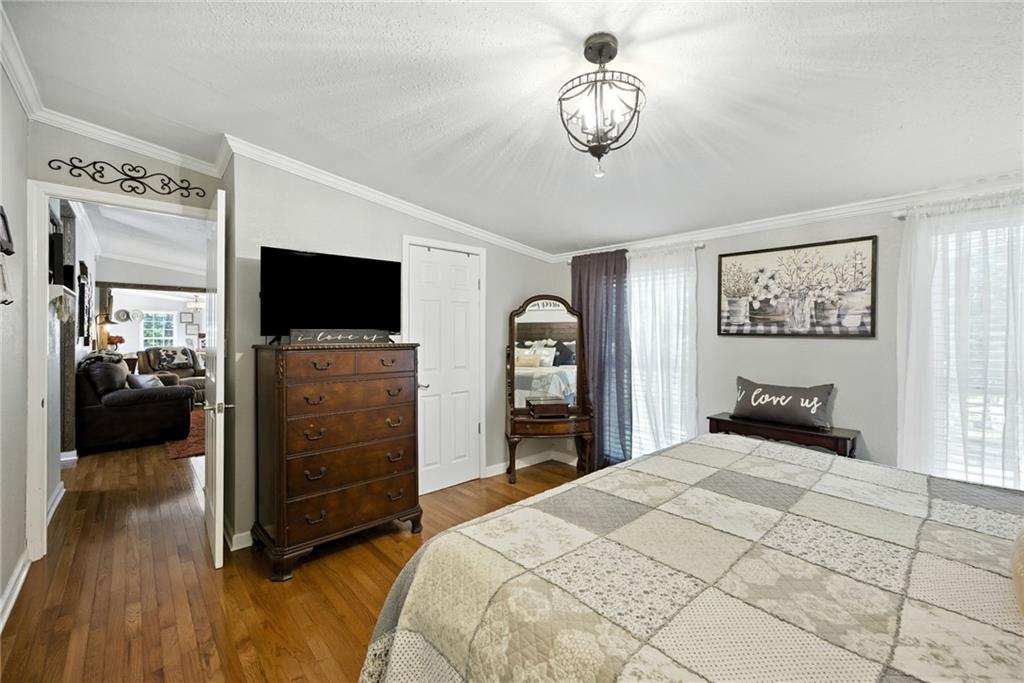 731 Borders Road Commerce, GA 30530 - Photo 39 of 75 a bedroom with a bed and a television