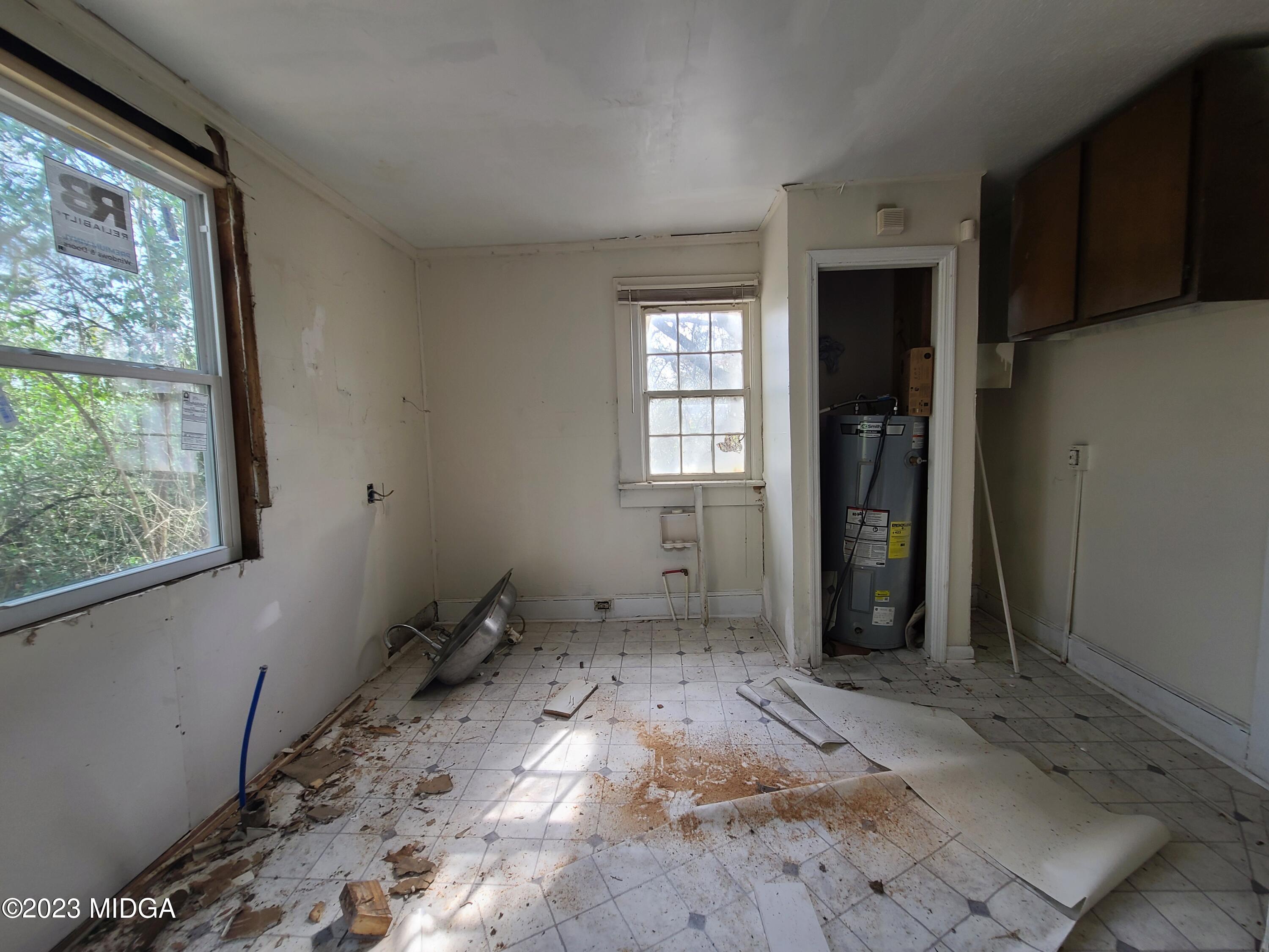424 Pansy Avenue Macon, GA 31204 - Photo 12 of 19 a view of empty room with windows