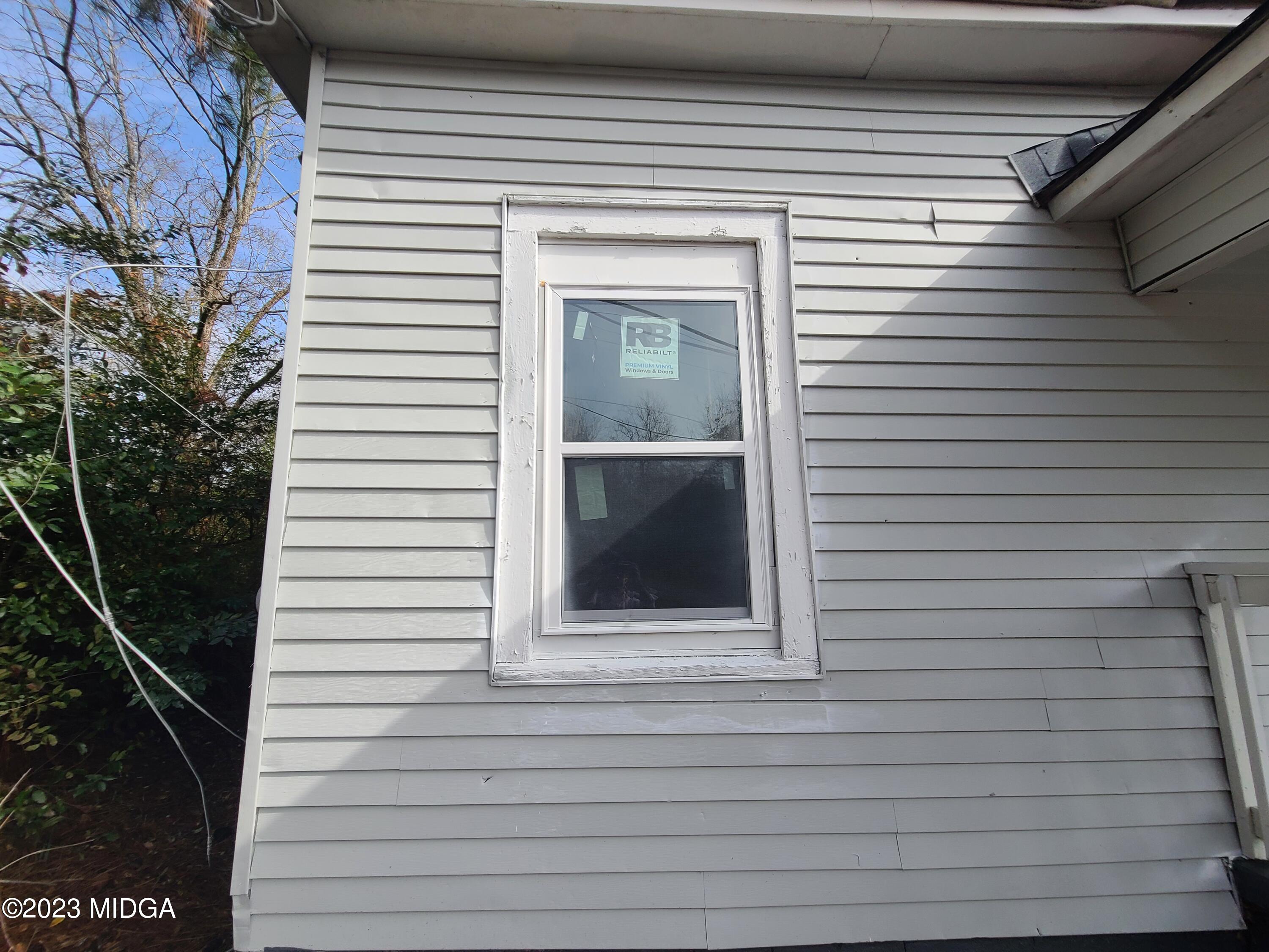 424 Pansy Avenue Macon, GA 31204 - Photo 3 of 19 a view of a house with a door and a window