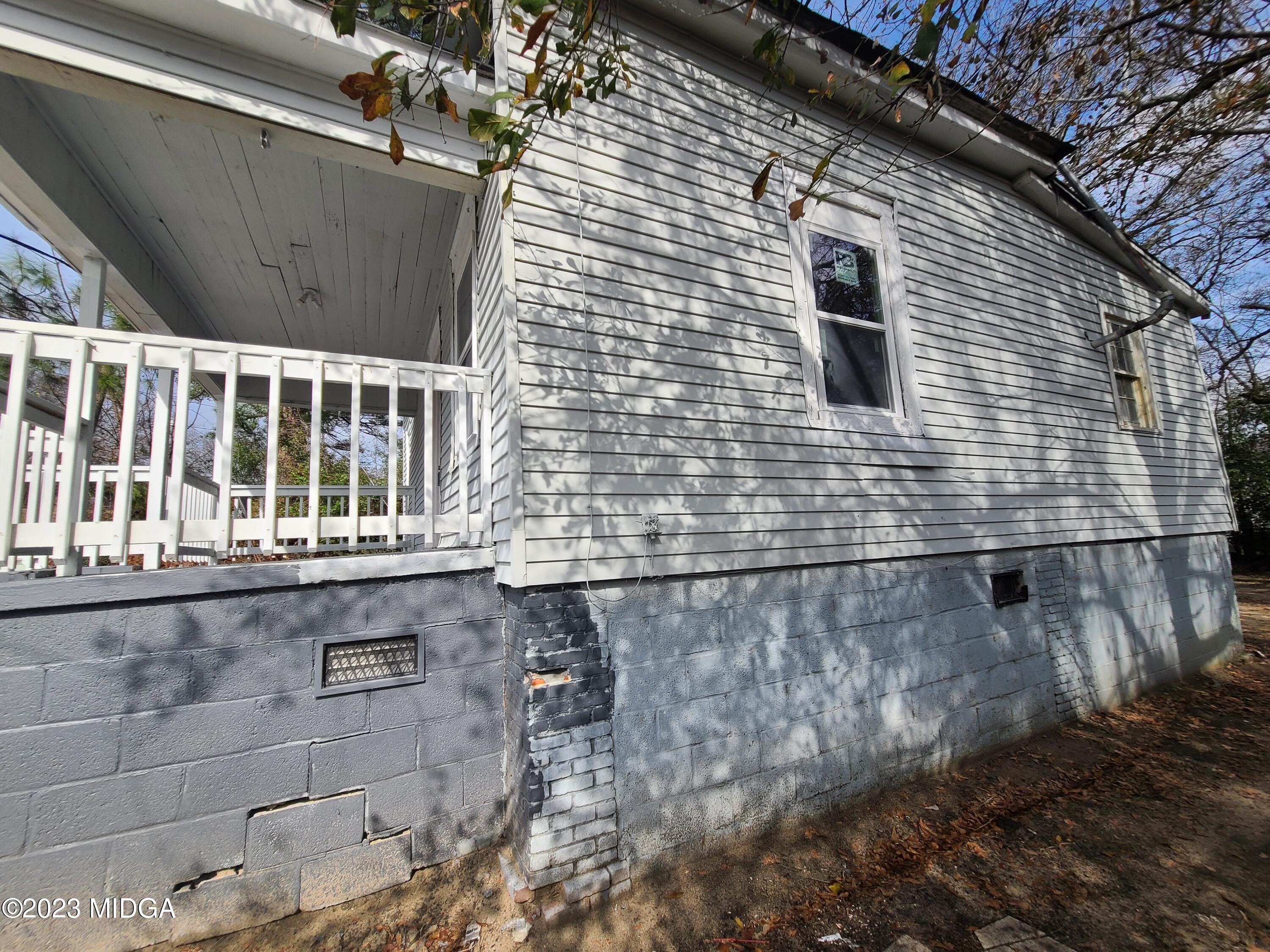 424 Pansy Avenue Macon, GA 31204 - Photo 6 of 19 a view of a wooden house