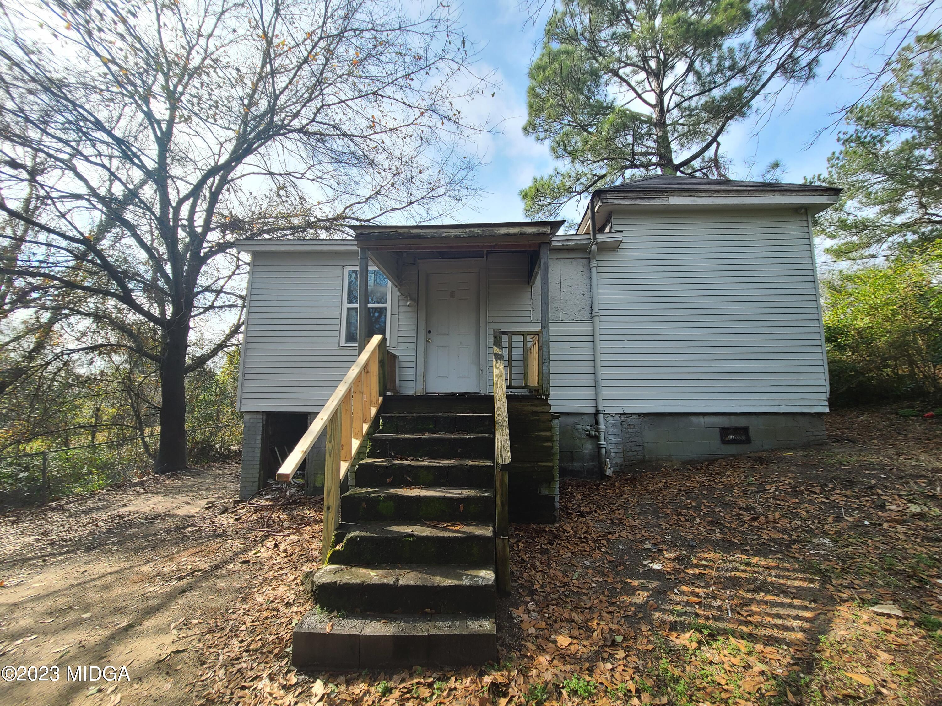 424 Pansy Avenue Macon, GA 31204 - Photo 8 of 19 a view of a house with a yard