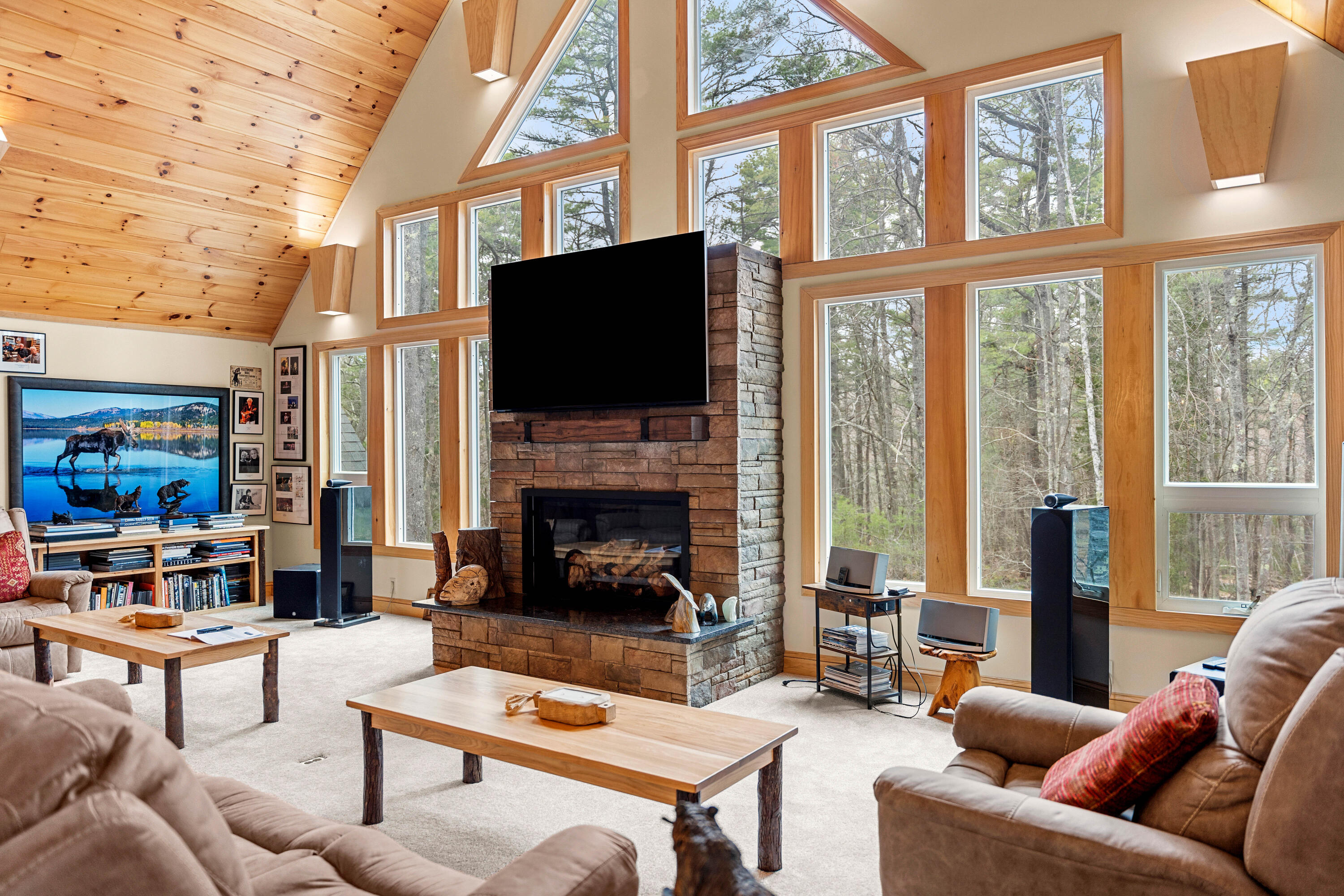 54 Stonetree Road Arrowsic, ME 04530 - Photo 19 of 52 great-room-windows-fireplace-54-stonetre