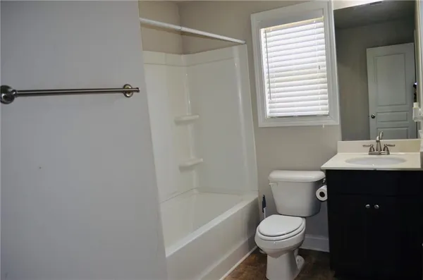 a house view with a garden space