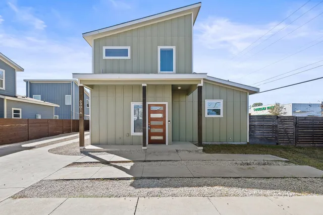 a view of a house with a garden