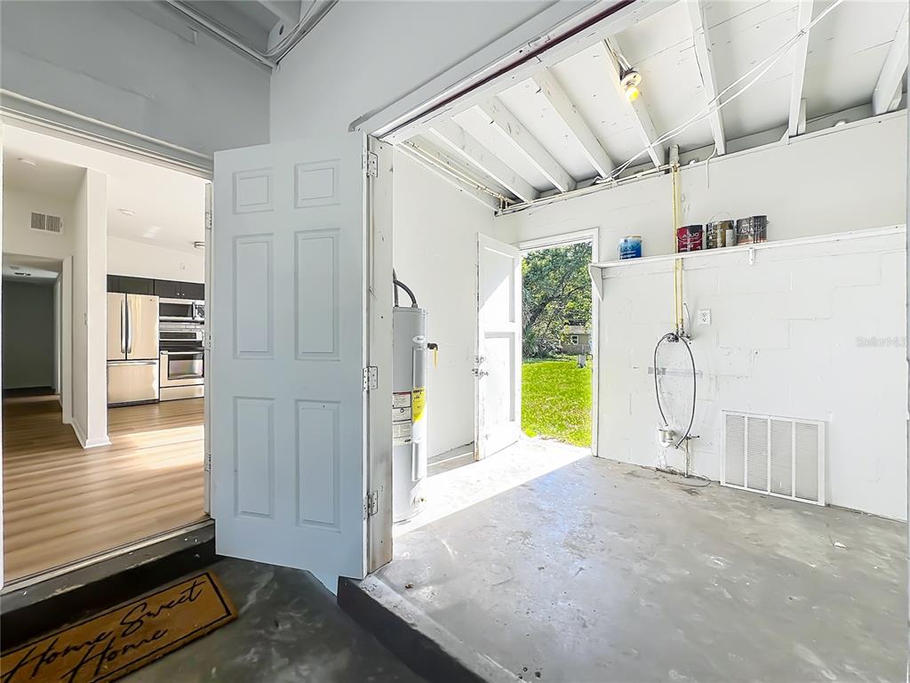 2001 Conway Gardens Road Orlando, FL 32812 - Photo 9 of 11 a view of a room with wooden floor and windows