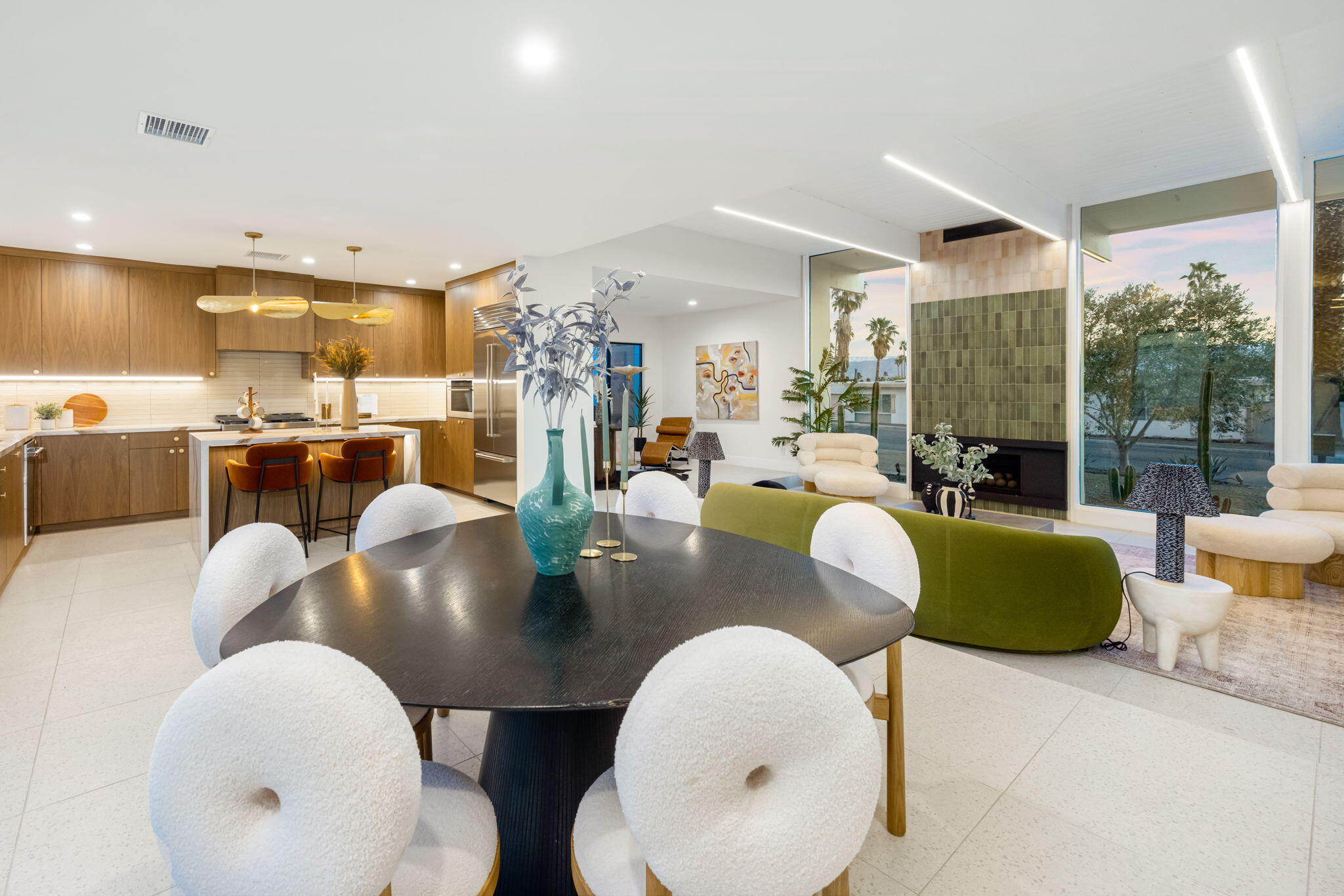 71459 Halgar Road Rancho Mirage, CA 92270 - Photo 12 of 46 a living room with furniture kitchen view and a large window
