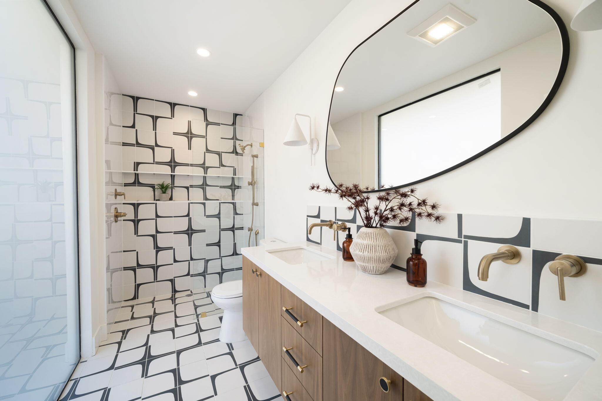 71459 Halgar Road Rancho Mirage, CA 92270 - Photo 16 of 46 a bathroom with a sink and a mirror