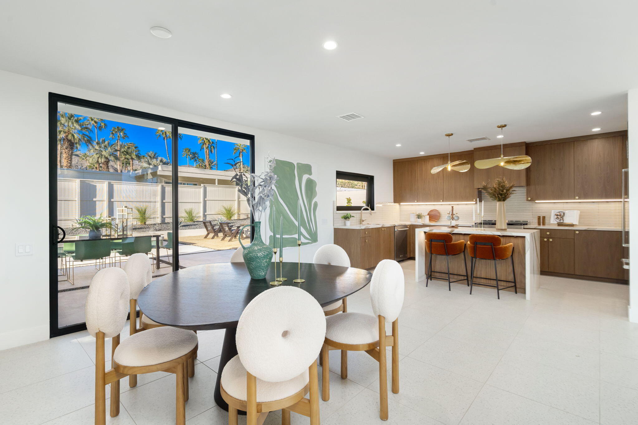 71459 Halgar Road Rancho Mirage, CA 92270 - Photo 23 of 46 a living room with dining room and kitchen view