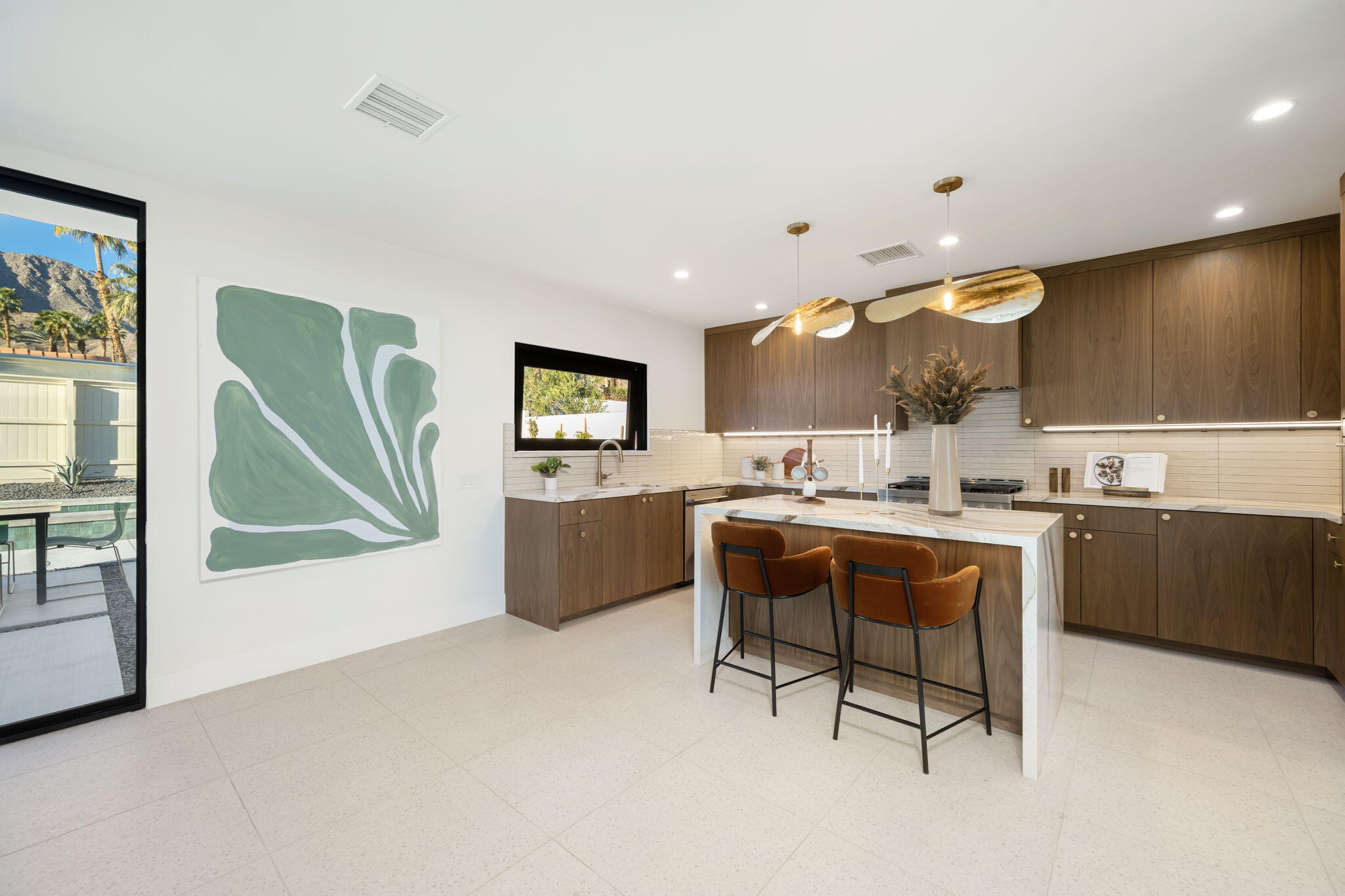 71459 Halgar Road Rancho Mirage, CA 92270 - Photo 24 of 46 a living room with kitchen furniture and a wooden floor